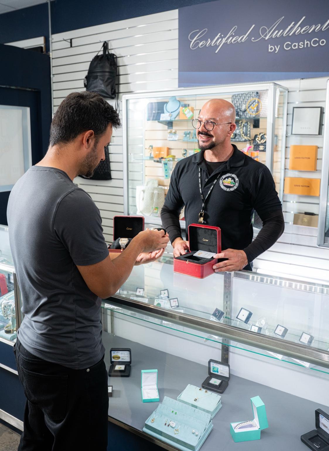 CashCo team member Willy helping a customer in a San Diego store